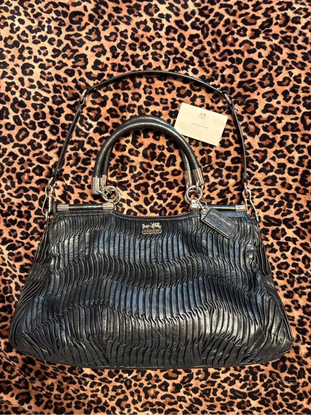 Black Coach Madison hand bag with shoulder strap